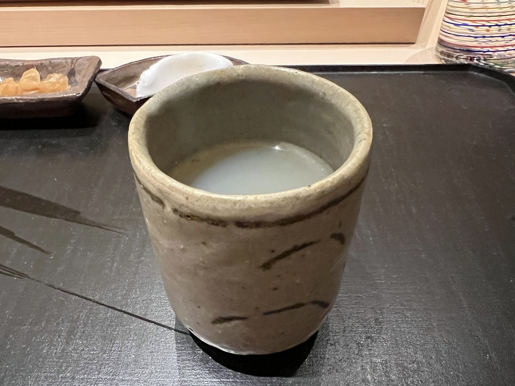 お吸い物(ハマグリの出汁) - 鮨 くろ﨑